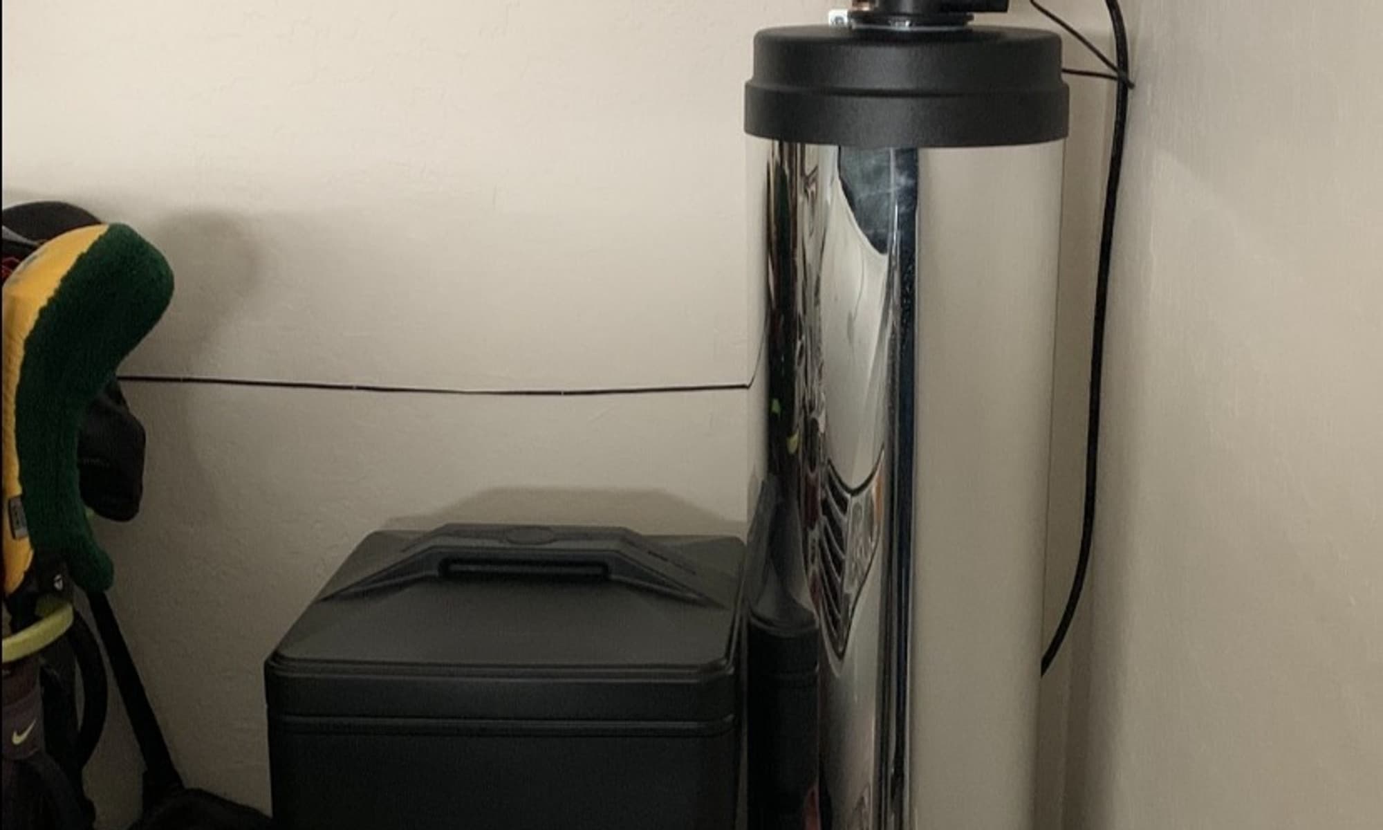 A completed water softener installation in a Phoenix valley home garage